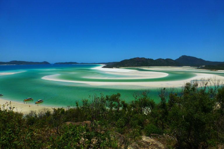 Breathtaking wide aerial of Whitehaven Beach with turquoise waters and white sand, Whitsundays Queensland Australia